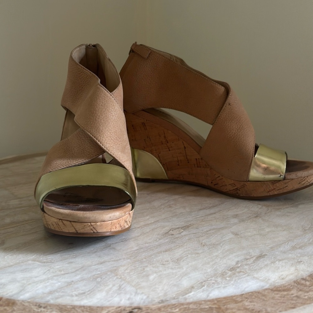 Cole Haan beautiful cork wedge with gold details.  Good condition